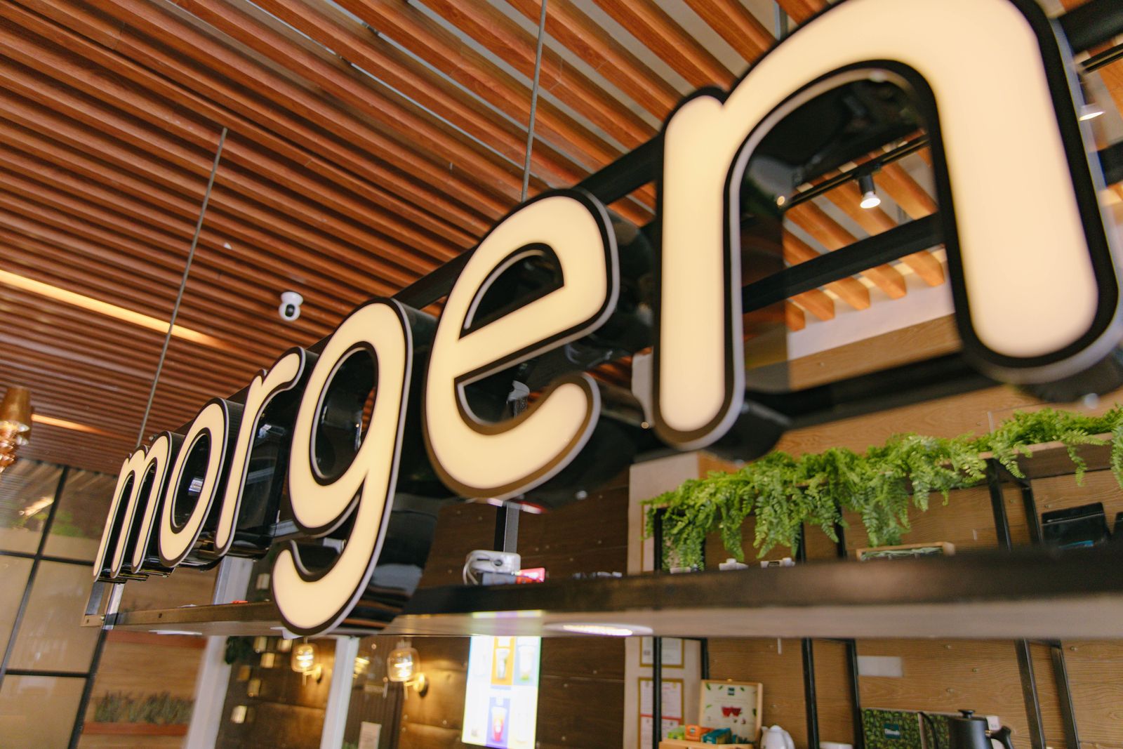 The morgen sign glowing above the bar
