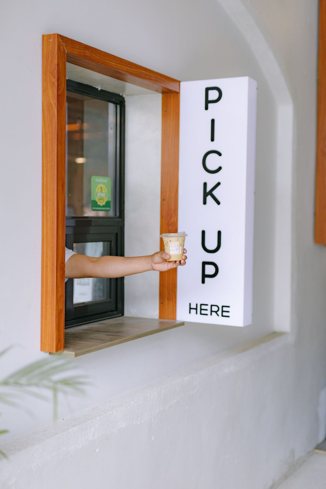 The Morgen pick-up window with a fresh iced coffee