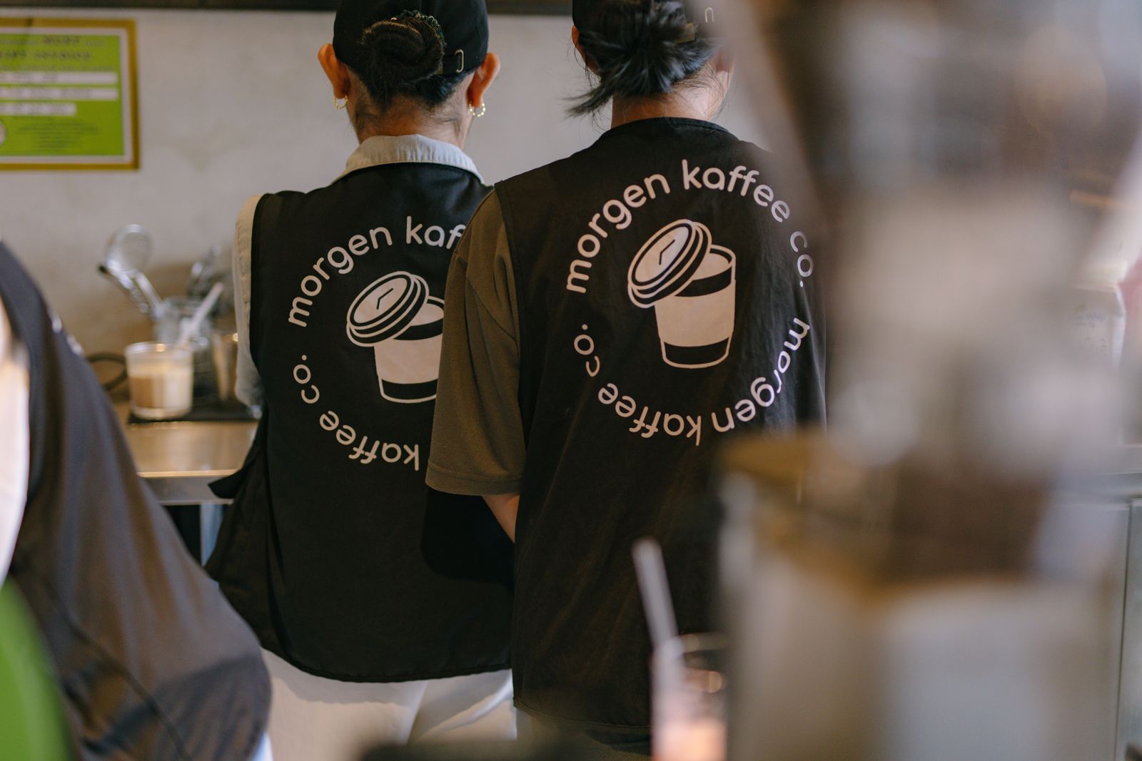 Morgen Kaffee Co. logo across a crew shirt