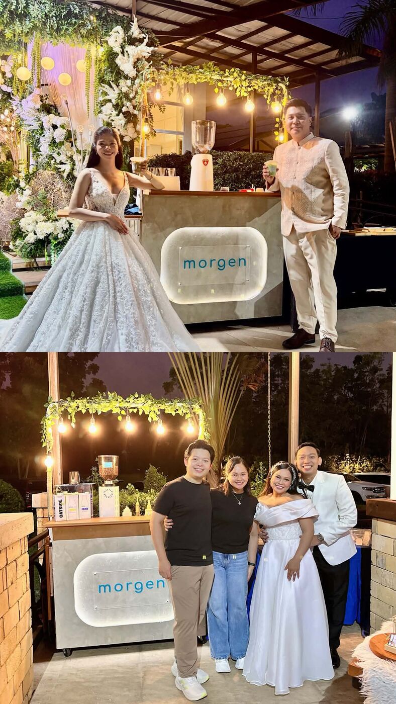 A wedding couple and family toasting with Morgen drinks beside the cart under string lights